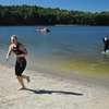 Rowery miejskie i triathlon na plaży w Kortowie